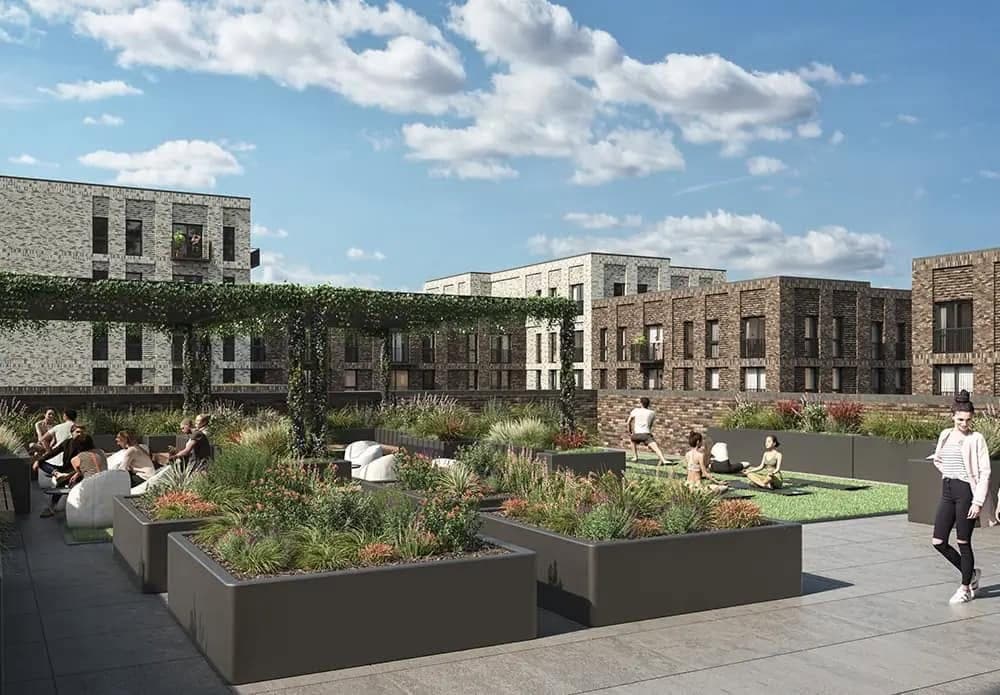Computer-rendered roof garden with planters between brick apartment blocks